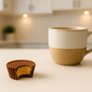 20251006_1755_Peanut Butter Cup Bite_remix_01k6xvq98mejdse86n99kce9pf.png__PID:828fe364-2a70-47f8-b633-42753bc33e0f
